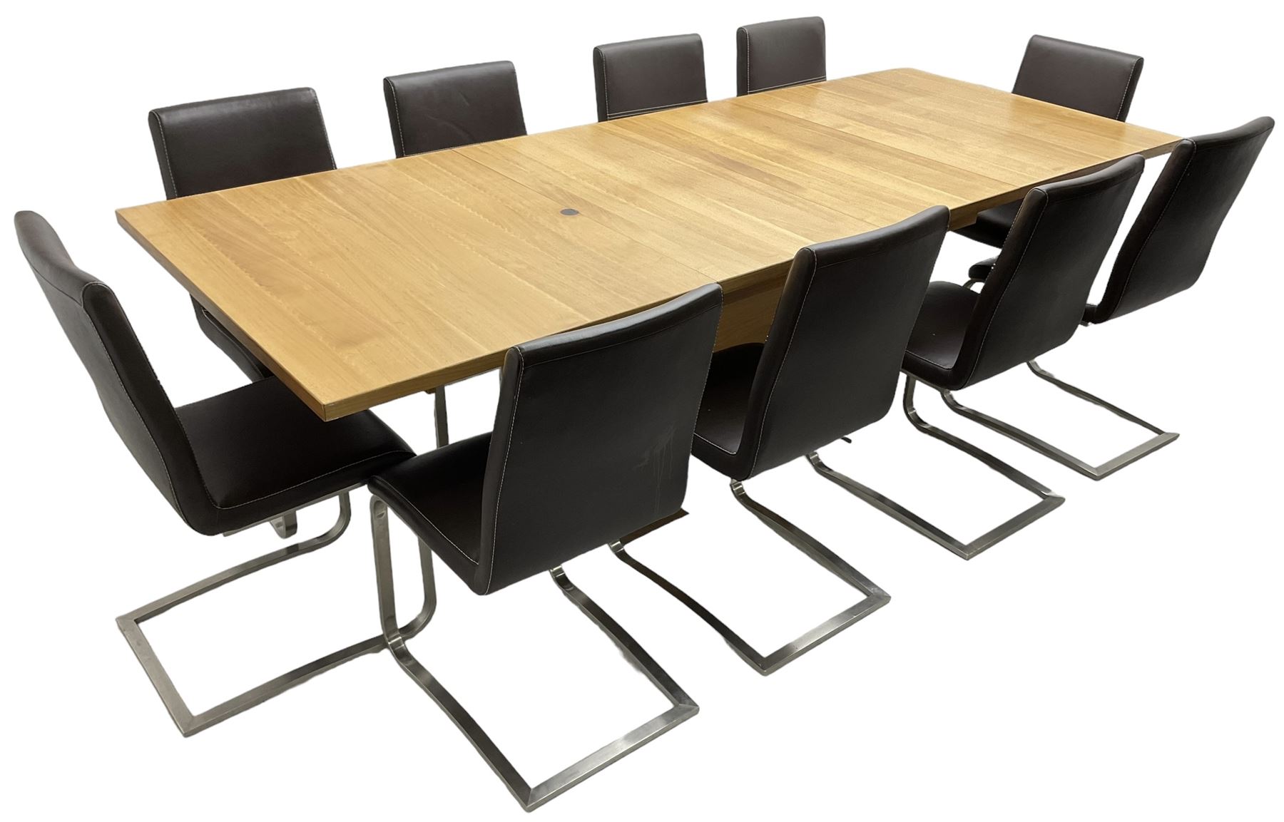Contemporary walnut extending dining table, rectangular pull-out extending action top with two additional leaves, on rectangular base with burnished metal feet (160cm - 258cm x 100cm, H78cm); together with a set of ten cantilever dining chairs upholstered in stitched brown leather, on burnished metal supports 