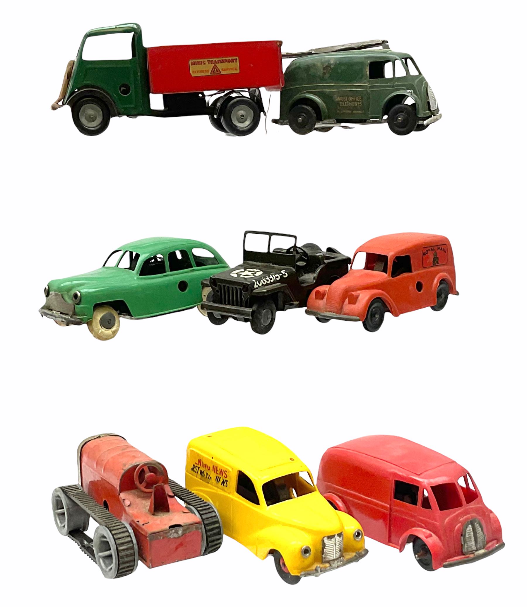 Eight Tri-ang Minic tin-plate/plastic clockwork vehicles comprising Tipper Lorry, Post Office Telephones Van, Caterpillar Tractor, Evening News Van, two Royal Mail Vans, American jeep and saloon car; all unboxed (8)