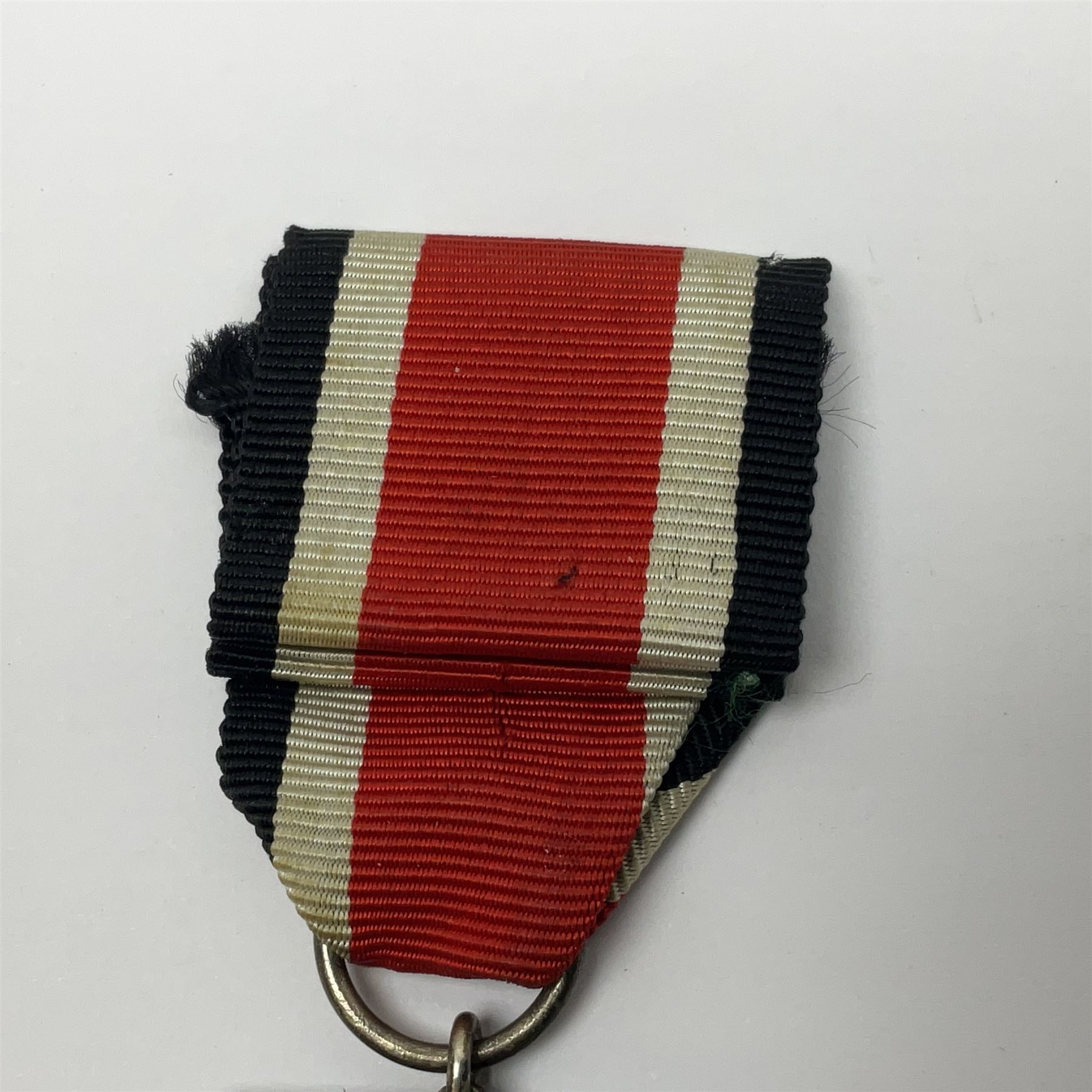 WWII German Iron Cross 2nd Class with ribbon; WWI German Wuerttemberg Medal with ribbon; and Day Badge for 1934 marked Reichsverband Pforzheim32 (3)