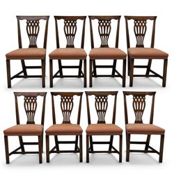 Set of eight George III dining chairs with padded seats, pierced vasiform splat, upholster...
