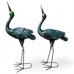 Pair of garden ornaments formed as two herons, H102cm (2)