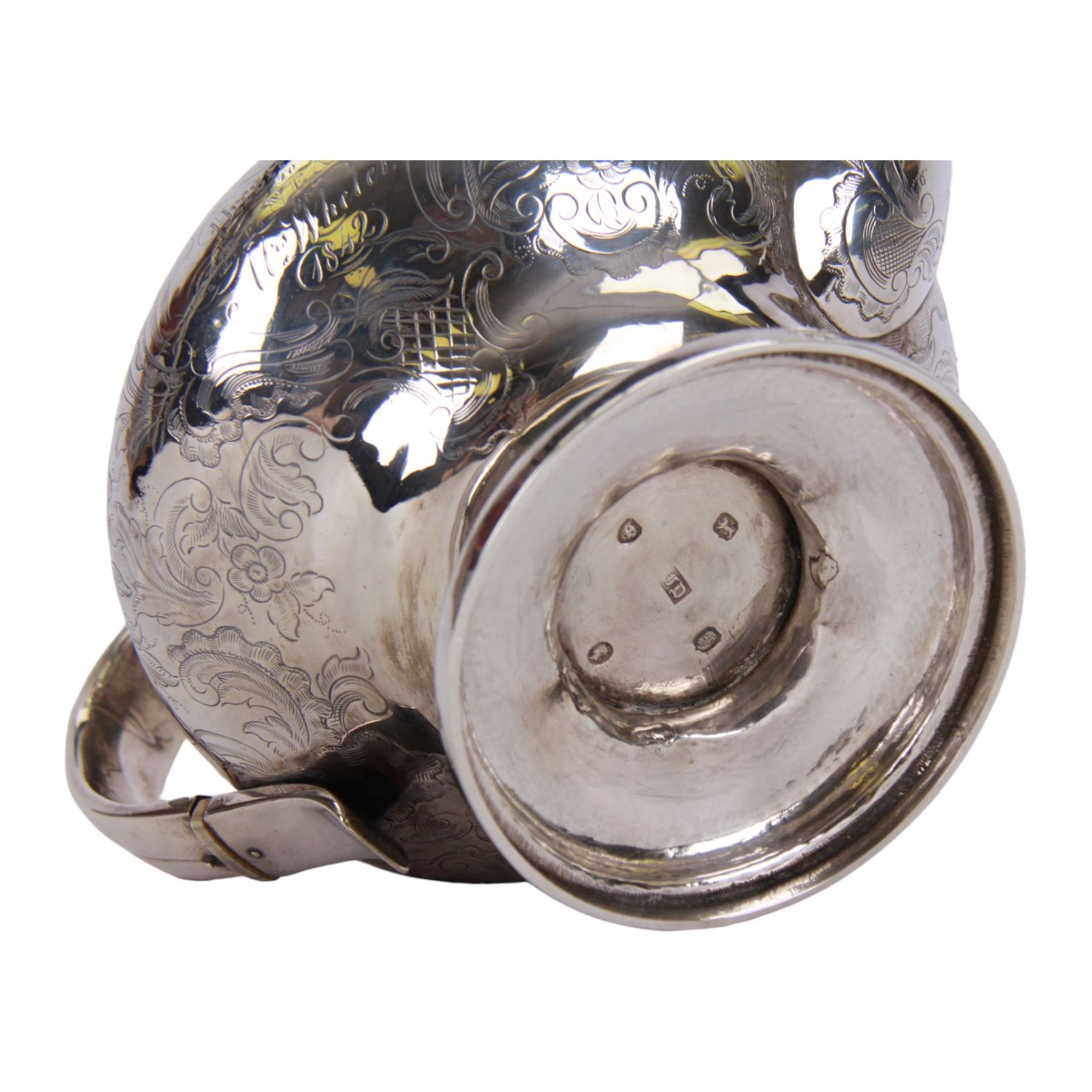 Victorian silver teapot, the body of bulbous form engraved with named cartouche and surrounded by flower heads and foliate scrolls, with capped strap handle with ivory insulator, and melon foliage mounted finial to the hinged lid, upon a circular stepped foot, hallmarked Francis David Dexter, London 1841, H17cm

This item has been registered for sale under Section 10 of the APHA Ivory Act