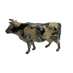 Britains Nestles 'The World's Cow' decorated with map-of-the-world pattern L8cm; and eight other various sized lead figures of cows, standing or reclining, by Britains, Hill & Co etc (9)