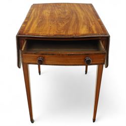 Goergian small butterfly pembroke table, the rectangular top with crossbanded edge and rounded drop leaves, single frieze drawer with opposing dummy drawer, raised on square tapering legs with stringing, terminating in brass castors