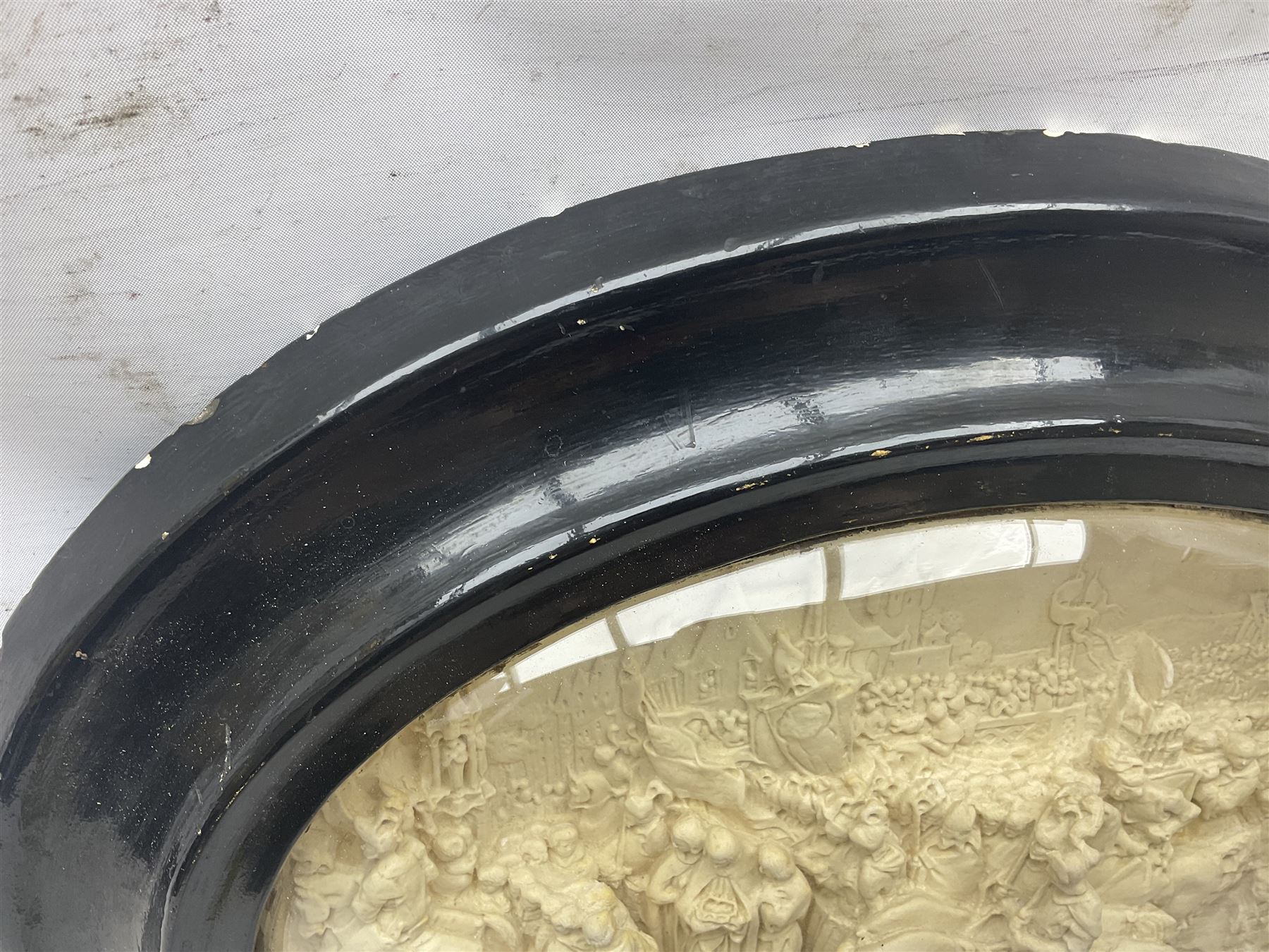 Justin Mathieu; oval high relief plaque depicting a battle scene, within frame H36cm