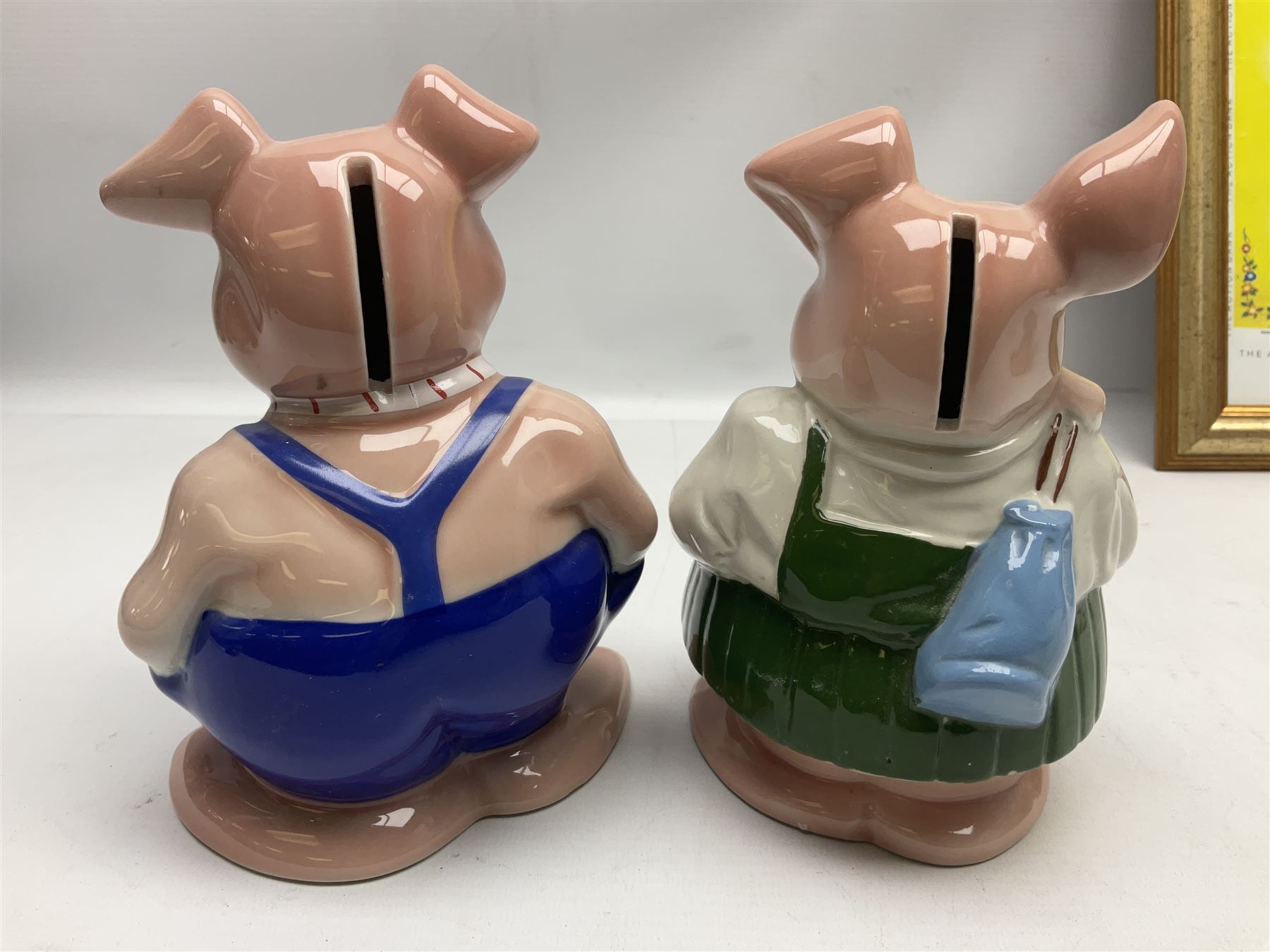  Full Set of Wade Natwest Pigs to include cousin Wesley, with an additional baby and framed leaflet 