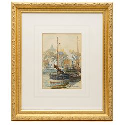 John Ernest Aitken (Scottish 1881-1957): 'An Old Scotch Fishing Town', watercolour signed, titled on label verso 24cm x 17cm; Edwin Earp (British 1851-1945): Fisherman in a Vast Loch, watercolour signed 40.5cm x 61.5cm (2)