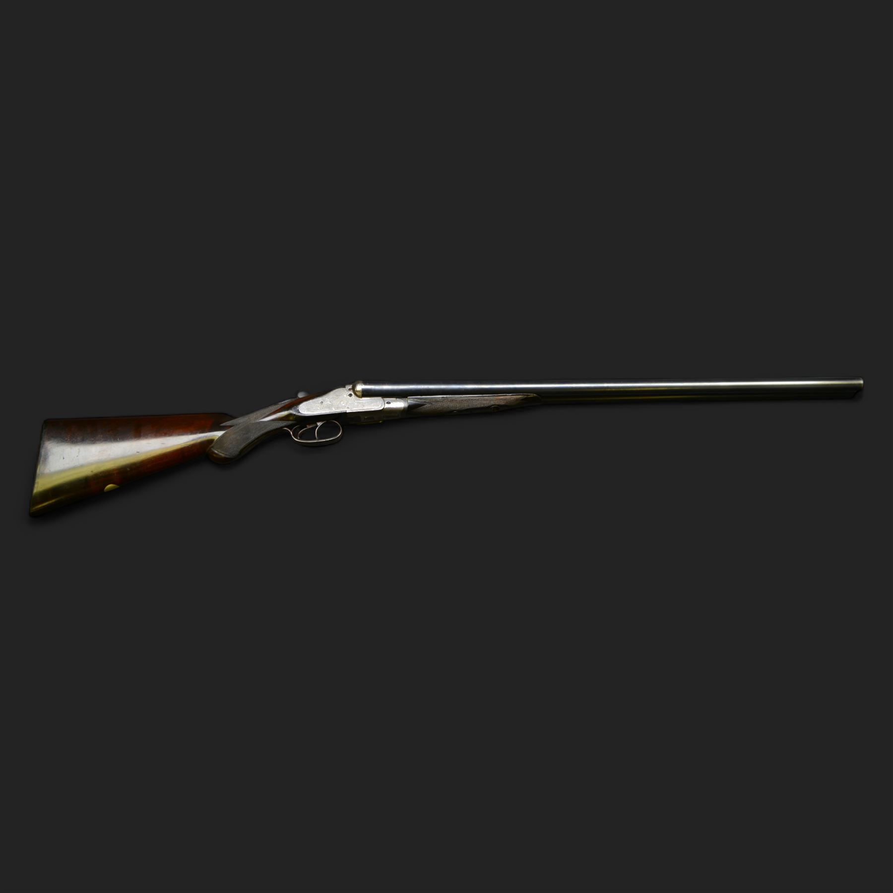 Carr Brothers of Huddersfield 12 bore side by side shotgun with engraved sidelock plates, trigger guard, underside, top plate, thumb lever and fences, chequered semi-pistol grip and horn tipped forend, vacant cartouche to the underside of the stock, double trigger and named 28 inch sleeved barrels choked ¾ and ½, overall length 113cm SHOTGUN CERTIFICATE REQUIRED