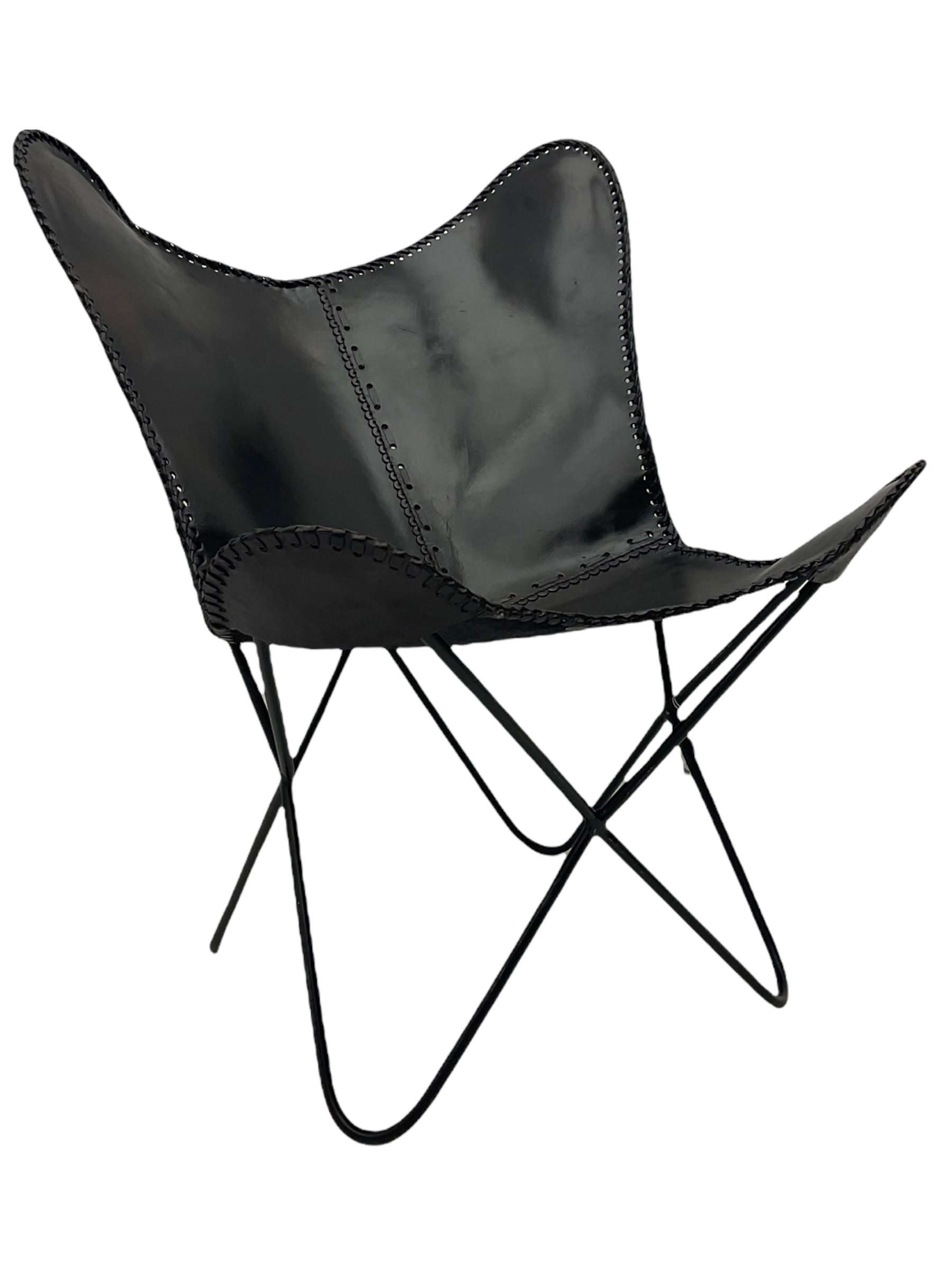 Metal framed butterfly chair upholstered in slung dark tan stitched leather 
