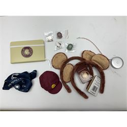 Five Charlie Bears Plush Hug Book Collection books, comprising Guide To Snuggleability containing Snuggleability CB191971F, Paw-Some Facts Directory containing Pawsome CB191971D, Bear Therapy Handbook containing Bear Therapy CB191971E, Study Buddy Handbook containing Study Buddy CB191971A, and Guide to Being Bear-illiant CB191971B, each designed by Isabelle Lee, each with tags, plus Charlie Bears Secret Hug Book (lacking contents), together with assorted Charlie Bear accessories, to include two Bear Ears Duffle headbands CBBEARSDUF, Egg Cup CB185198 , Incy Wincy CB205252AO, with tag, four key rings, all with tags, Bear Care Kit and contents, recipe cards, pin badges, tape measure, notebook, etc., (Qty)