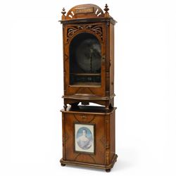 Late 19th century coin operated floor standing Polyphon, the shaped cornice marked 'Polyph...