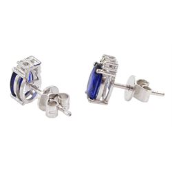 Pair of 18ct white gold oval cut sapphire and round brilliant cut diamond stud earrings, stmaped, total sapphire weight approx 2.00 carat