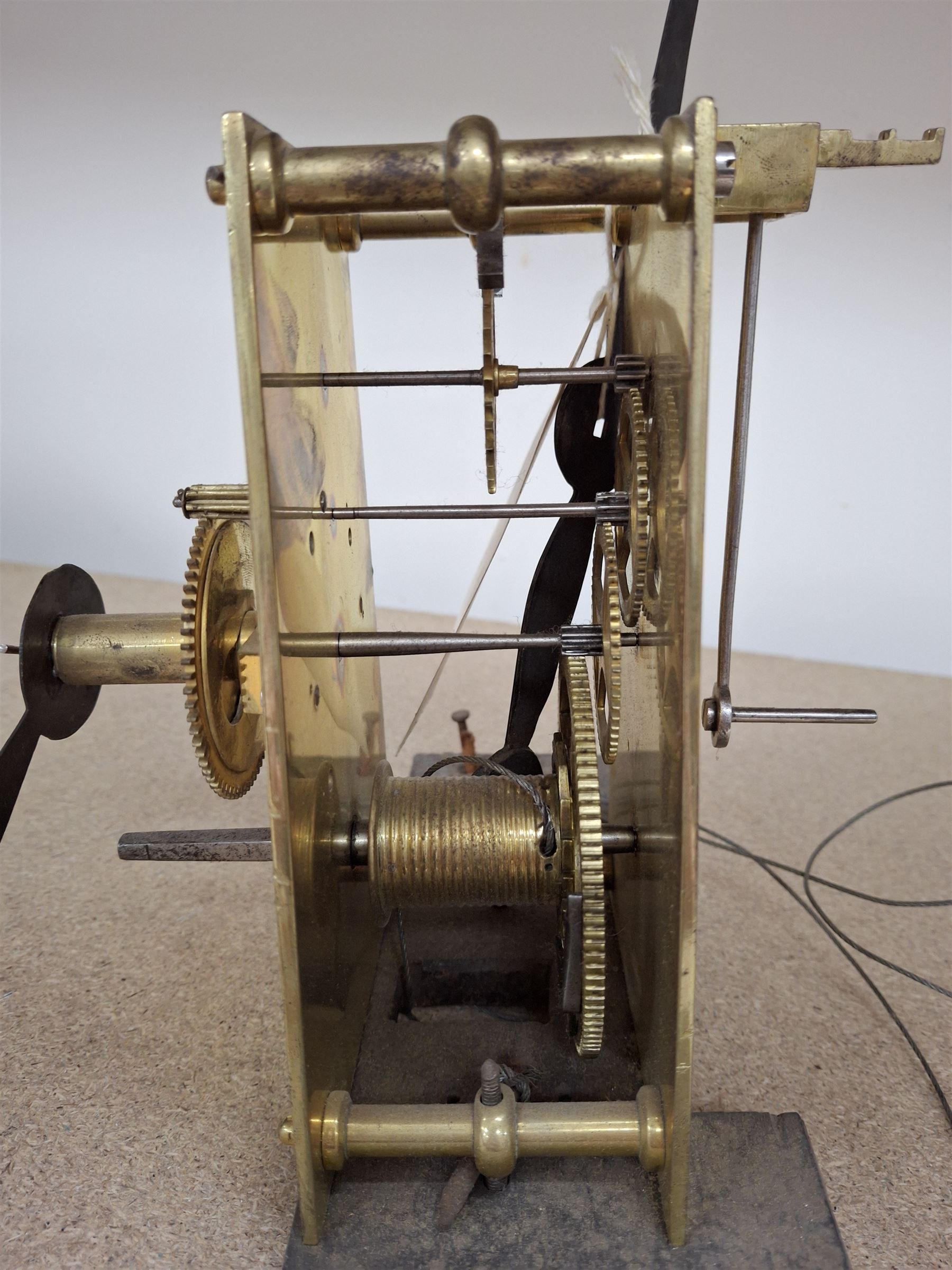 Two skeleton clock movements, tavern clock movement, and further clock movements, all for restoration 
