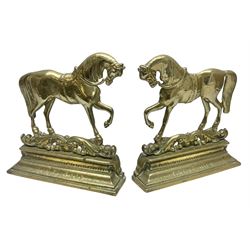 Pair of brass horse doorstops, the bases engraved Linthorpe and Grove Hill, H29cm
