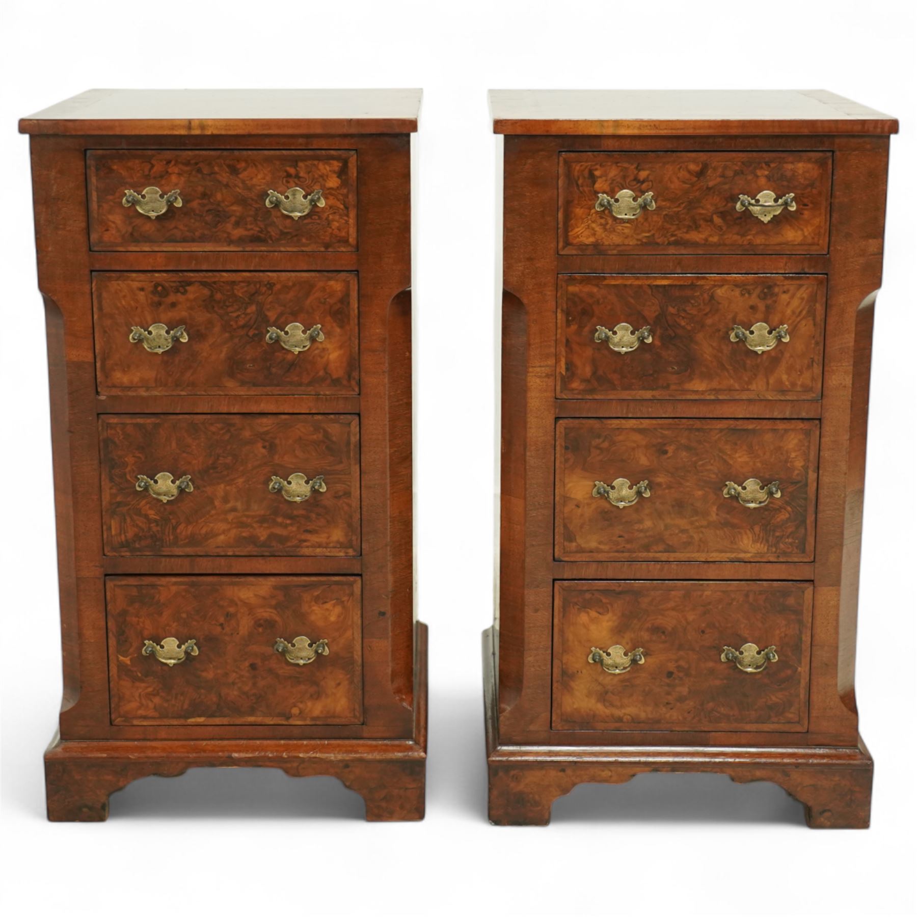 Pair of Victorian inlaid burr walnut small size chests,  rectangular top in burr walnut and crossbanded with herringbone inlay and chamfered sides with four graduated inlaid burr walnut drawers and engraved cut brass handles and mahogany drawer linings, supported on moulded bases with shaped bracket feet, circa 1870