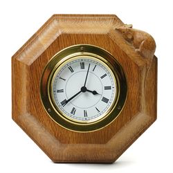 Mouseman - oak wall clock, circular Roman dial in brass drum on moulded octagonal mount, c...