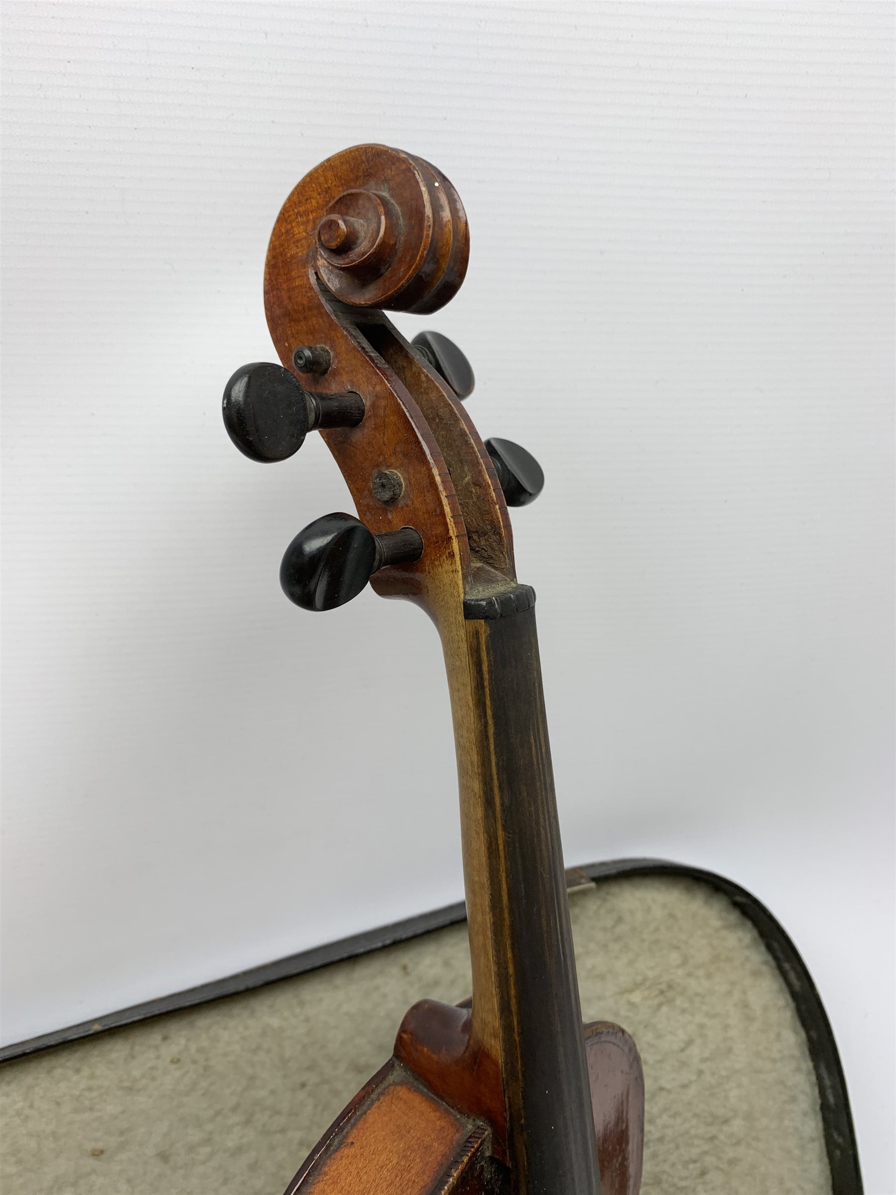 1920s German violin for completion with 36cm two-piece maple back and ribs and spruce top, lacks tailpiece, bridge and strings, 59cm overall, in carrying case