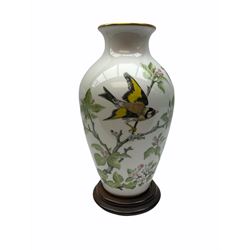 Pair of Franklin Porcelain ovoid vases, The Meadowland Bird Vase and The Woodland Bird Vase by Basile Ede H30cm, with wooden stands and certificates.