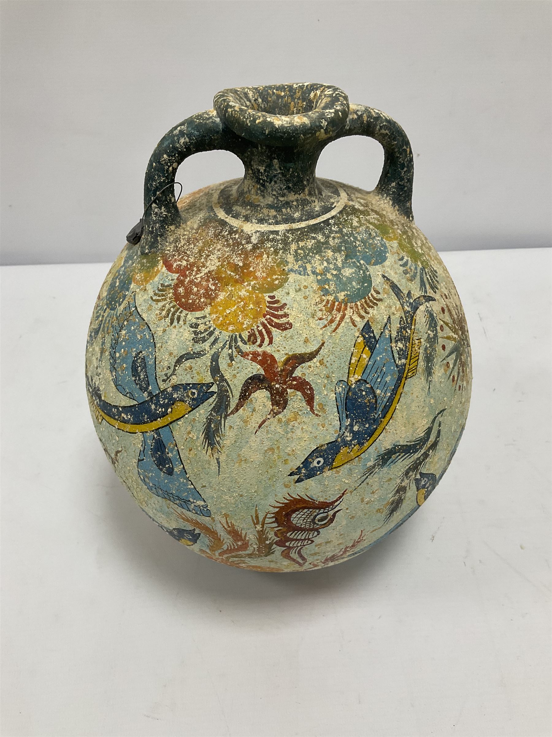 Reproduction Ancient Greek twin handled vase of ovoid form, in the style of Crete Minoan period 1500 B.C, adorned with colourful sea scene of coral and blue fish upon light blue ground, stamped 'From Krete' beneath, H27cm