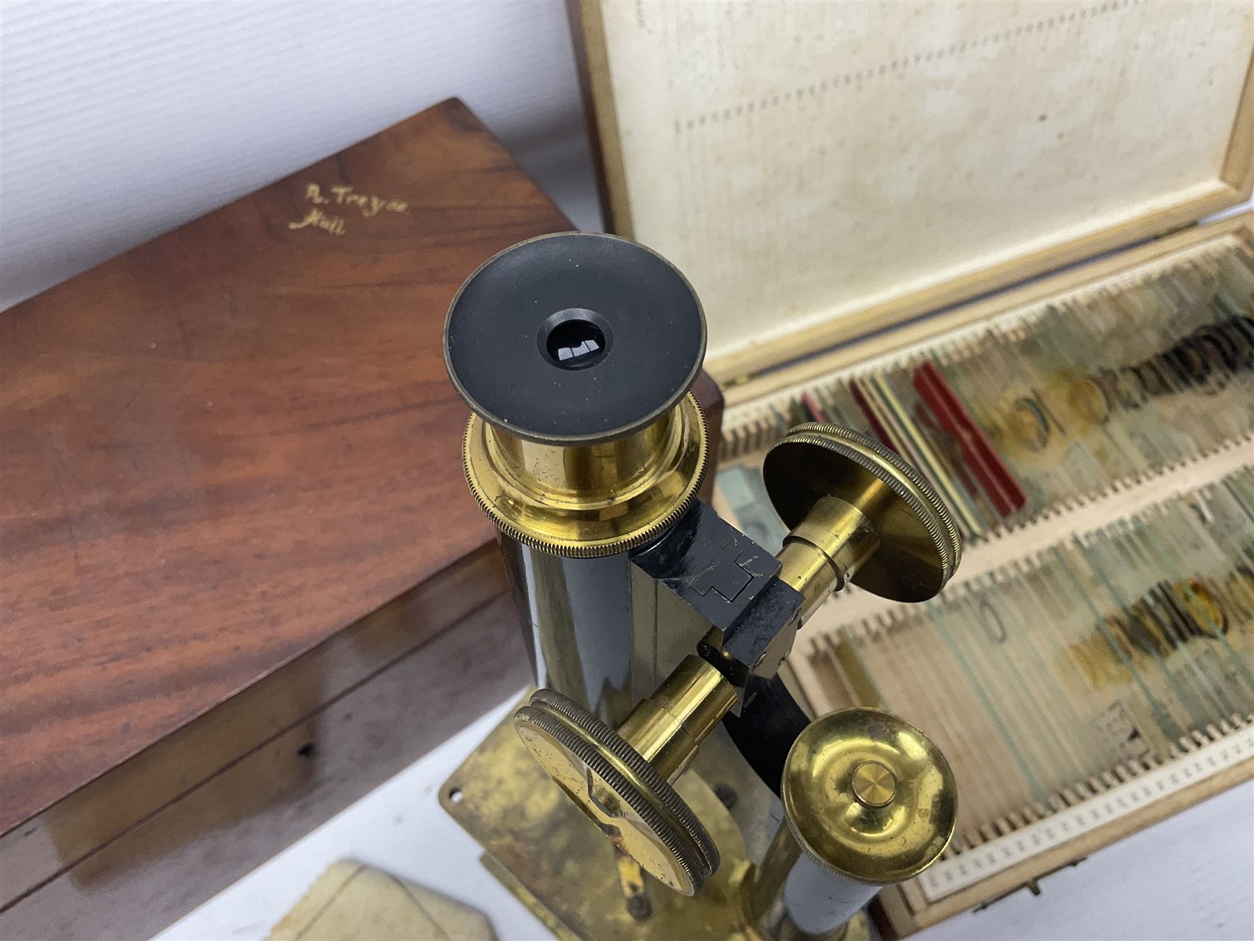 R & J Beck London microscope, model 7597, contained in fitted case, together with a boxed collection of glass microscope biological sample slides