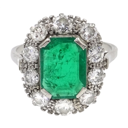  Platinum emerald cut emerald and diamond cluster ring, stamped Plat  