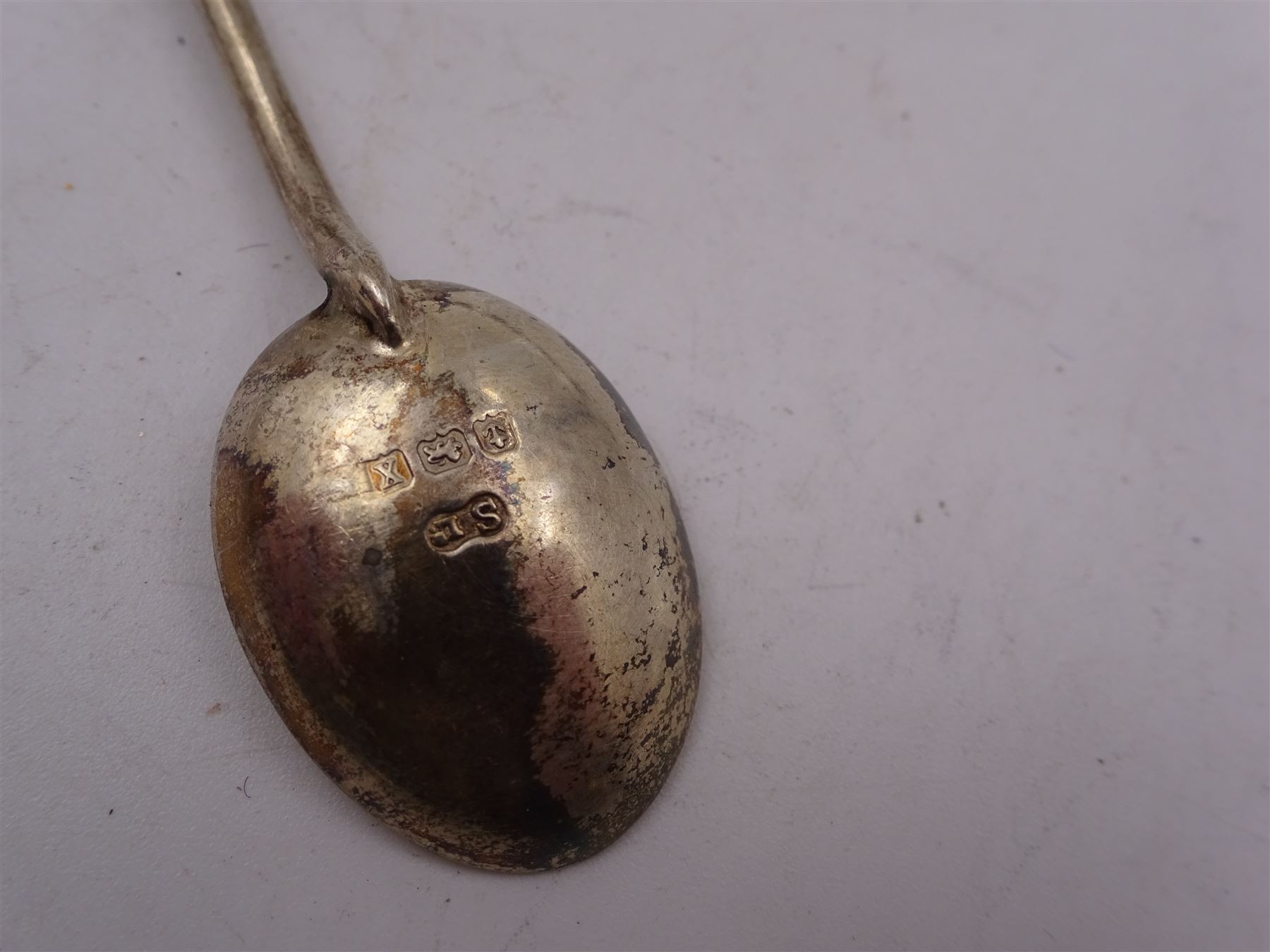 Set of six 1920s silver coffee bean spoons, together with a collection of silver souvenir and similar spoons, including two filigree examples, all tested or hallmarked