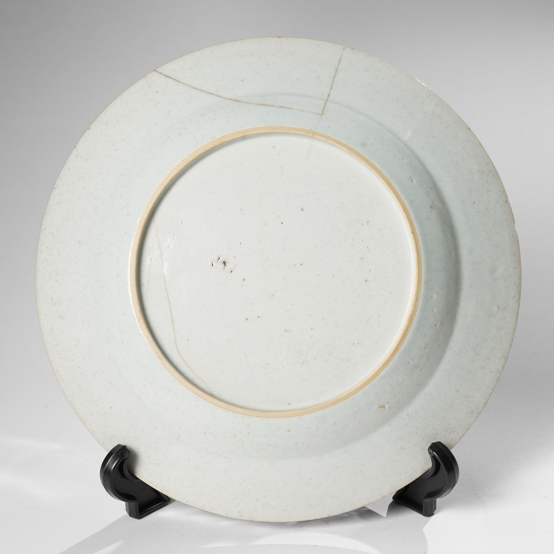 Three Chinese Kangxi period blue and white plates, painted in underglaze blue with various patterns, including Butterfly and Rockery, Pagoda and River Landscape, and floral sprays, each approx. D23cm (3)