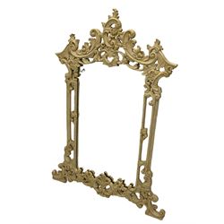 Rococo style carved wood wall mirror, decorated with scrolling foliage and flower head motifs