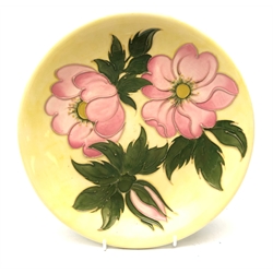  Walter Moorcroft Wild Rose pattern circular plate on yellow ground, D26cm   