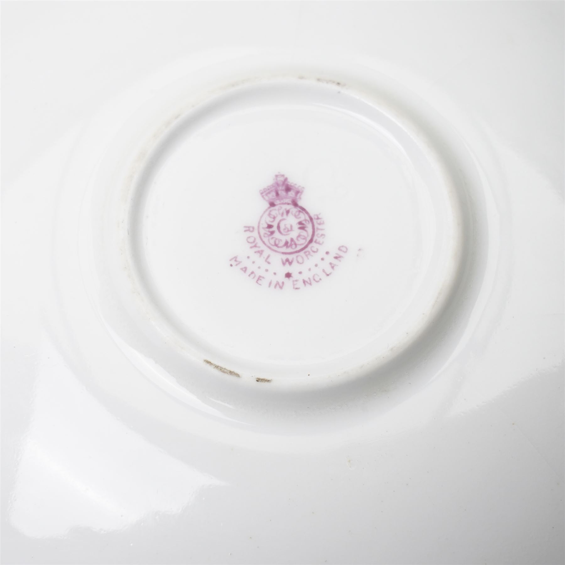 Royal Worcester cabinet cup and saucer, each painted with pheasants in a landscape, by James Stinton, each with backstamp in puce, teacup H5cm
