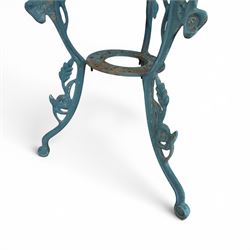 Cast iron garden table and four chairs, in the Art Nouveau style, with pierced floral and foliate decoration throughout, circular table raised on four cabriole legs with stretcher ring, chairs with shaped openwork backs and seats, in a weathered green finish