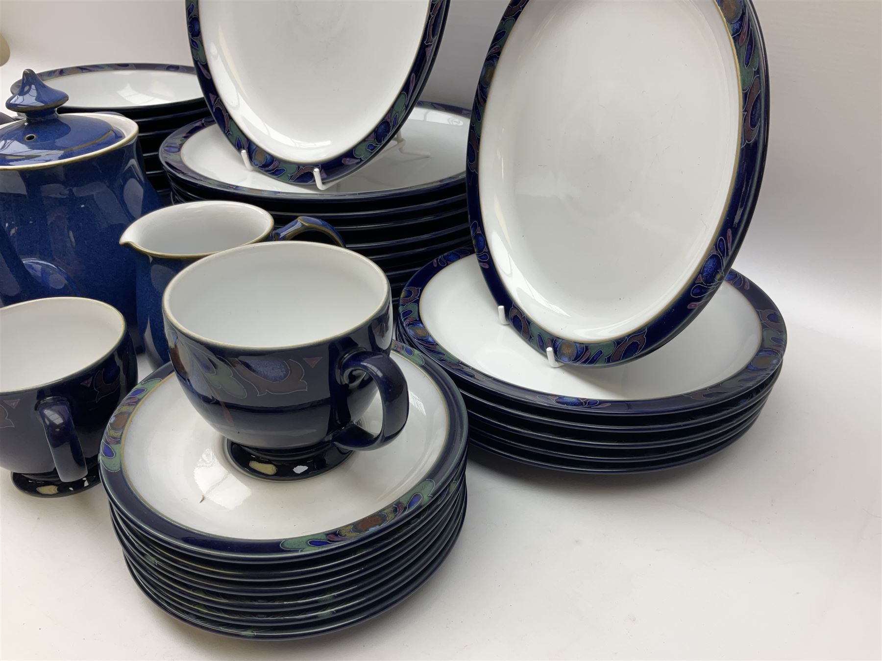 Denby Baroque pattern part tea and dinner service, comprising nine dinner plates, six side plates, six bowls five dessert plates, six cups and saucers, together with a Denby teapot and jug in Imperial blue pattern