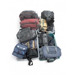 Large collection of camera bags and carry cases, including Lowepro, Town & Country, Nikon,...