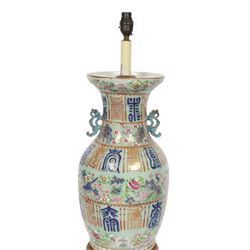 Early 20th century Chinese celadon ground vase, converted to lamp, of baluster form with flared neck and applied twin scroll handles to shoulders, the body decorated with polychrome enamels of birds amongst flowering branches, between bands of archaistic characters in blue, iron red and gilt, including fittings H60cm