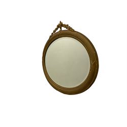  Gilt Adam style mirror, the oval bevelled glass plate with urn pediment