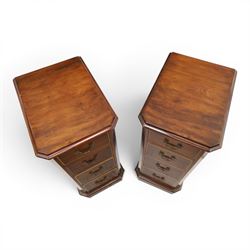 Pair of Edwardian mahogany pedestal chests, of moulded rectangular form, above four graduated drawers, brass swan neck handles, moulded plinth base