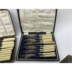 Six canteens of fish knives and forks, including a set of six crusade fish knives and forks with faux ivory handles 