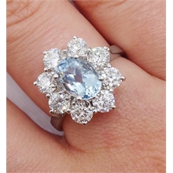 18ct white gold aquamarine and diamond flower cluster ring, hallmarked, aquamarine approx 1.30 carat, diamond total weight approx 1.60 carat

[image code: 5mc]
