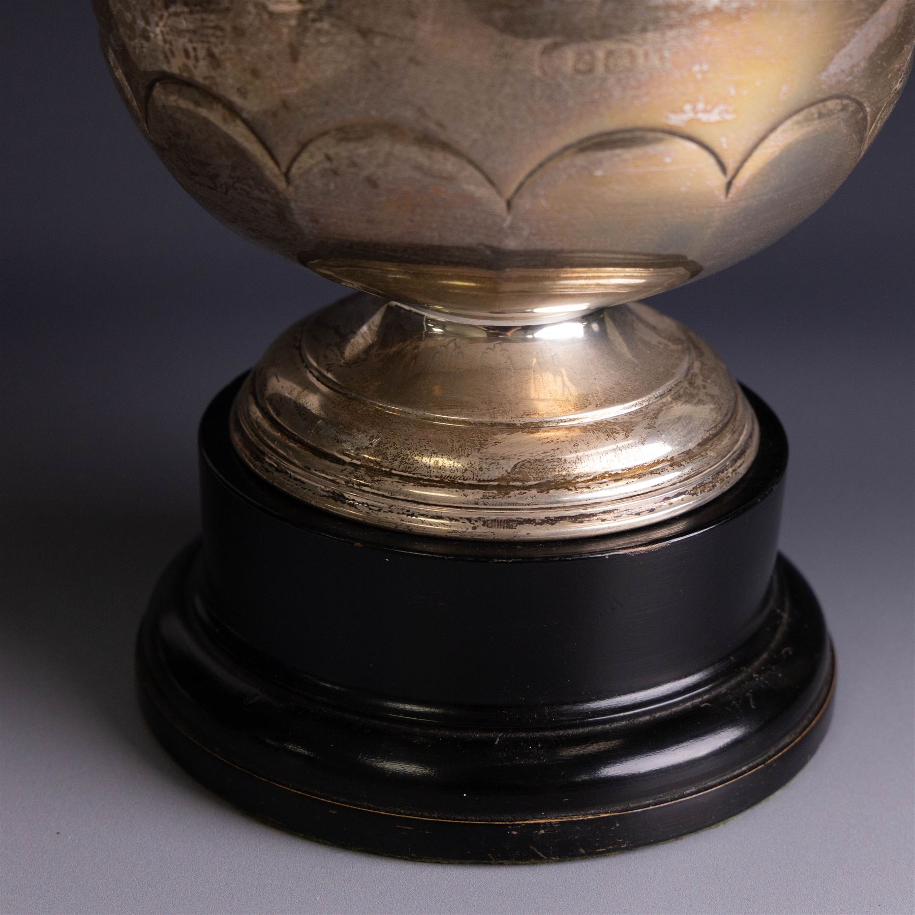 Edwardian silver pedestal bowl, of part fluted circular form, hallmarked Birmingham 1909, maker's marked worn and indistinct, upon an ebonised wooden pedestal, bowl H11.5cm