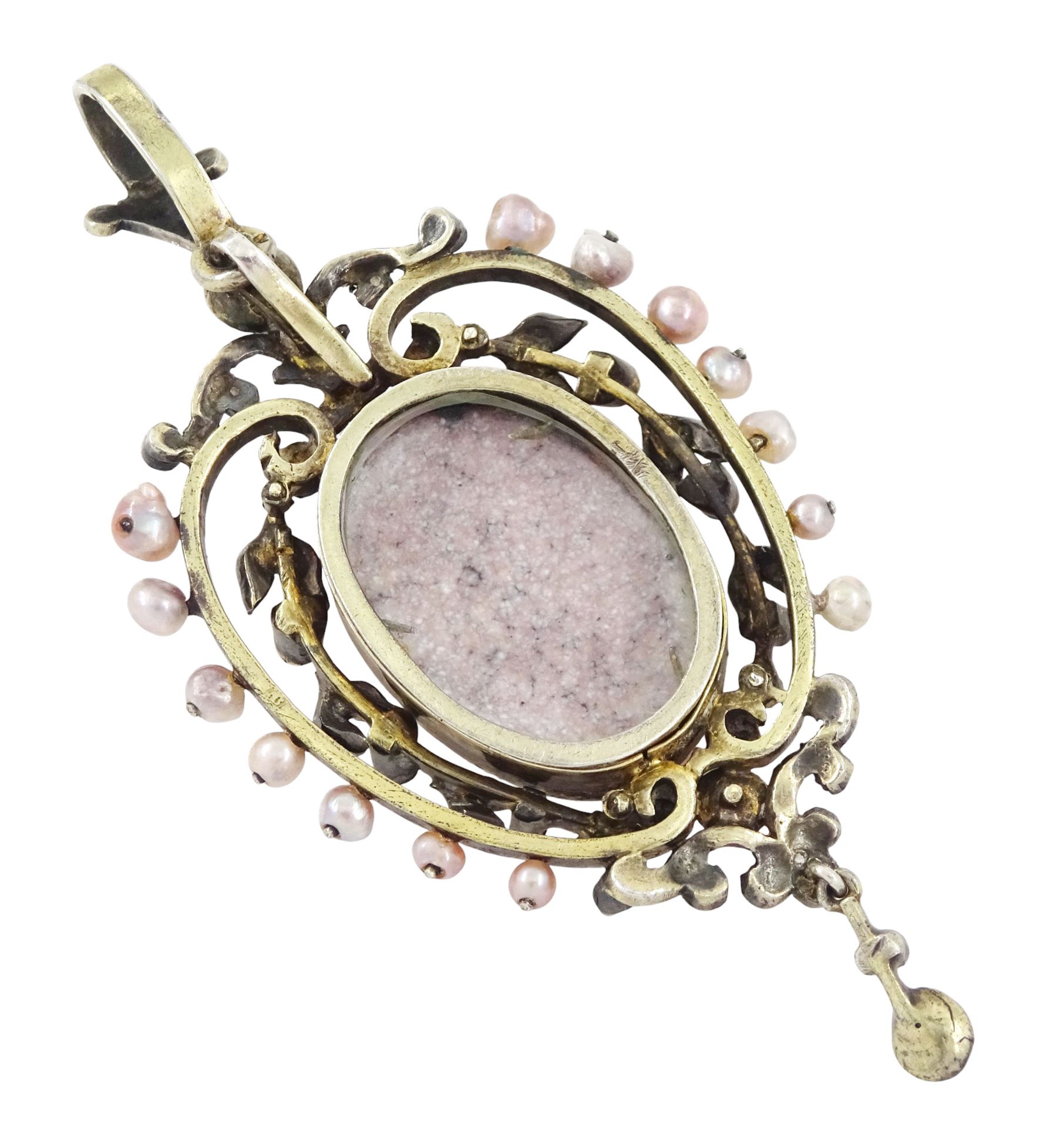19th century silver pearl locket pendant, set with an oval painted enamel plaque of a cherub holding flowers, within an openwork pearl set surround