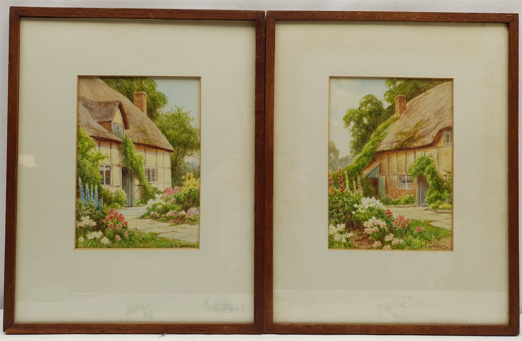 Sidney Valentine Gardner (Staithes Group 1869-1957) Thatched Cottage Gardens, pair watercolours signed 23cm x 16cm (2)