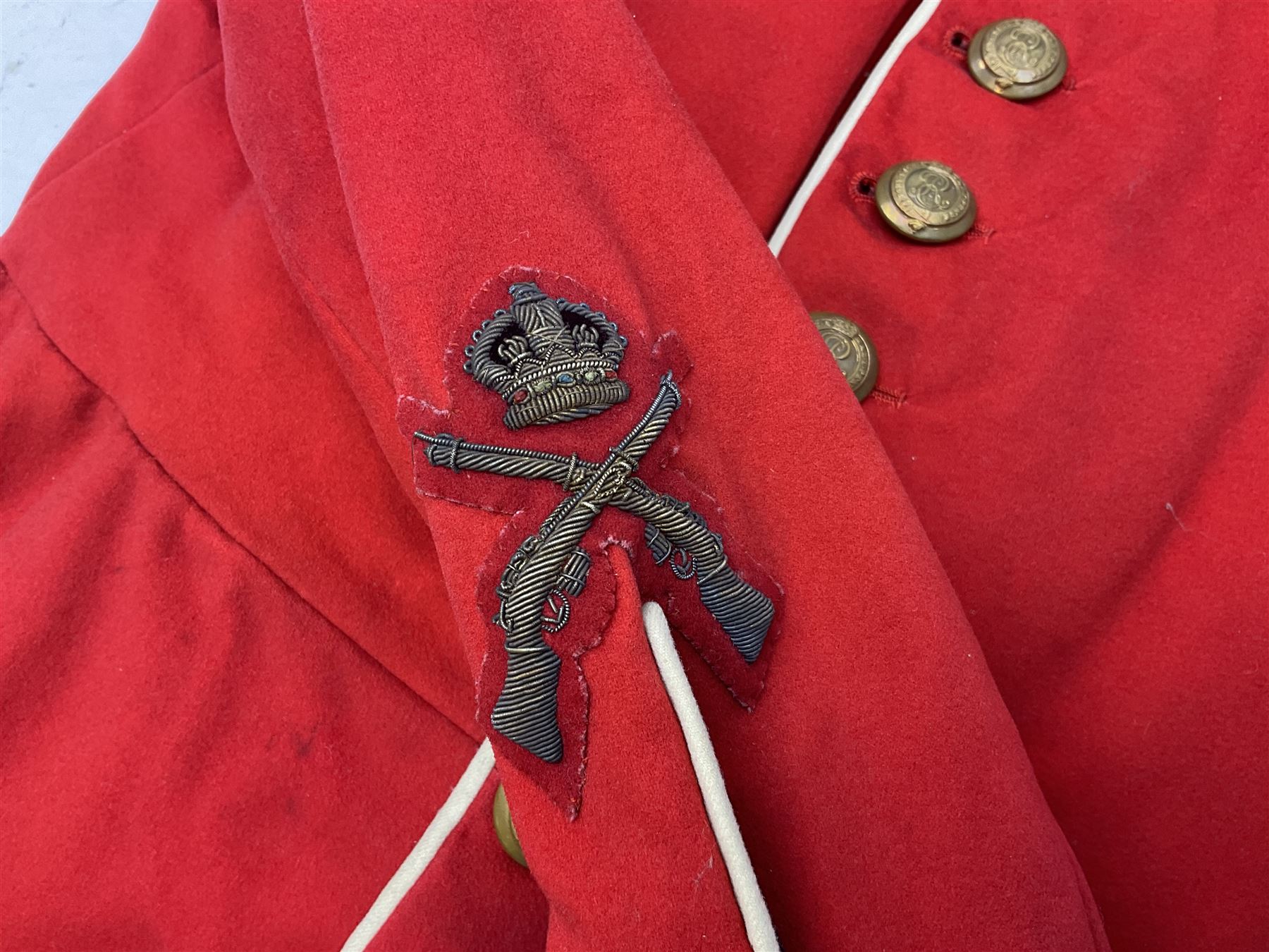 Royal Military College Sandhurst parade uniform with peaked cap and two-piece mess dress, all bearing historic manuscript labels for J.E.A. Baldwin, possibly Air Marshal Sir John Eustace Arthur Baldwin (1892-1975) who served in the British Army 1910-18 & 1944-58 and in the RAF 1918-44.