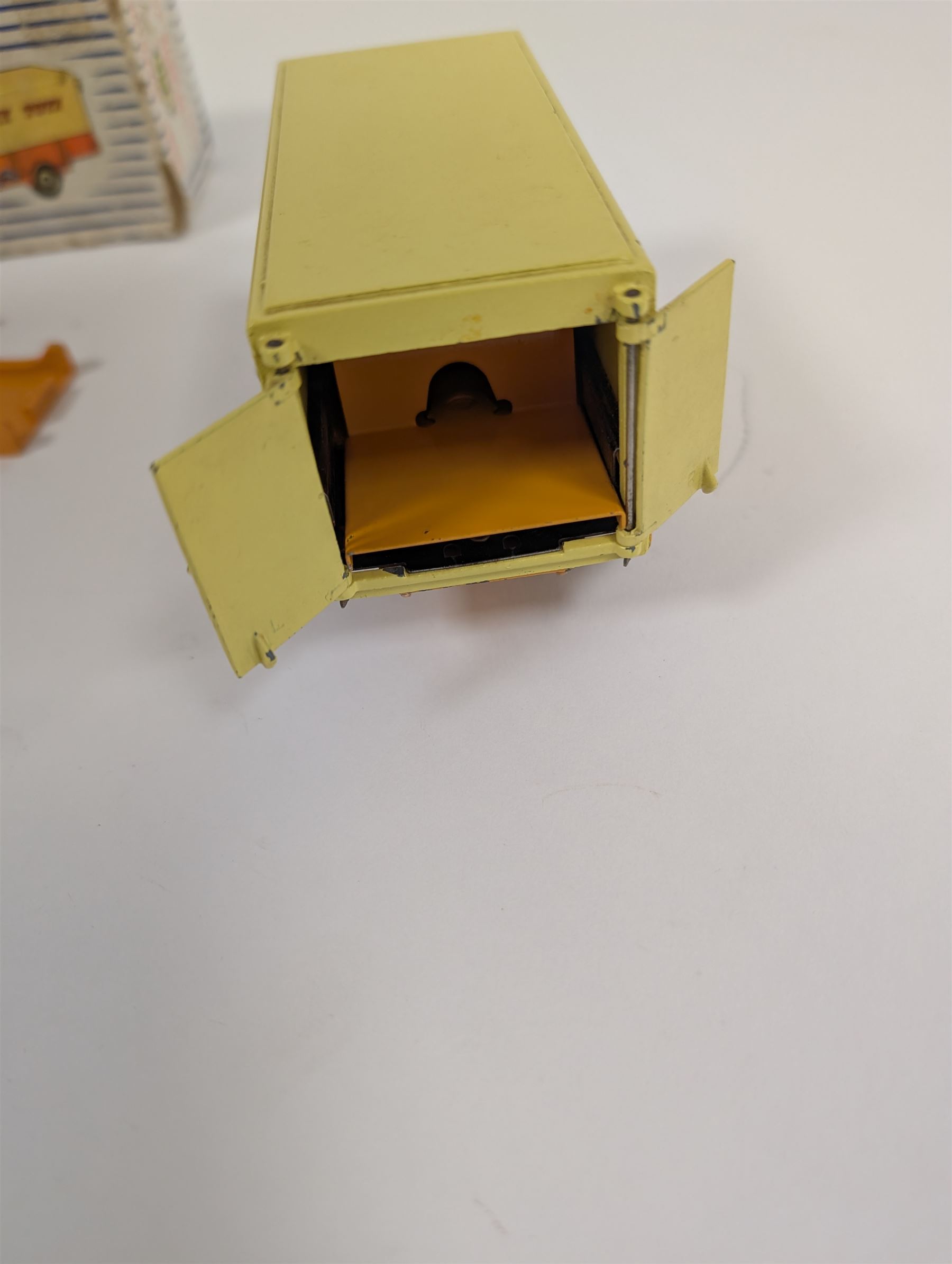 Dinky Toys Bedford Pallet Jekta Van no 930, two tone yellow body with red 'Dinky Toys' lettering, in original box with two orange pallets and instructions
