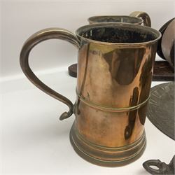 Two 19th century copper tankards, one with weighted wooden base, together with copper and wooden mechanical bellows, sundial and other metalware 