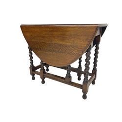 20th century oak drop-leaf dining table on spiral turned supports 