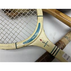 Quantity of early 20th century and later tennis rackets, to include Artus Majesty, Dunlop Alpha, Atlas Silver Shield and Raleigh Konni, together with a stitched rugby ball