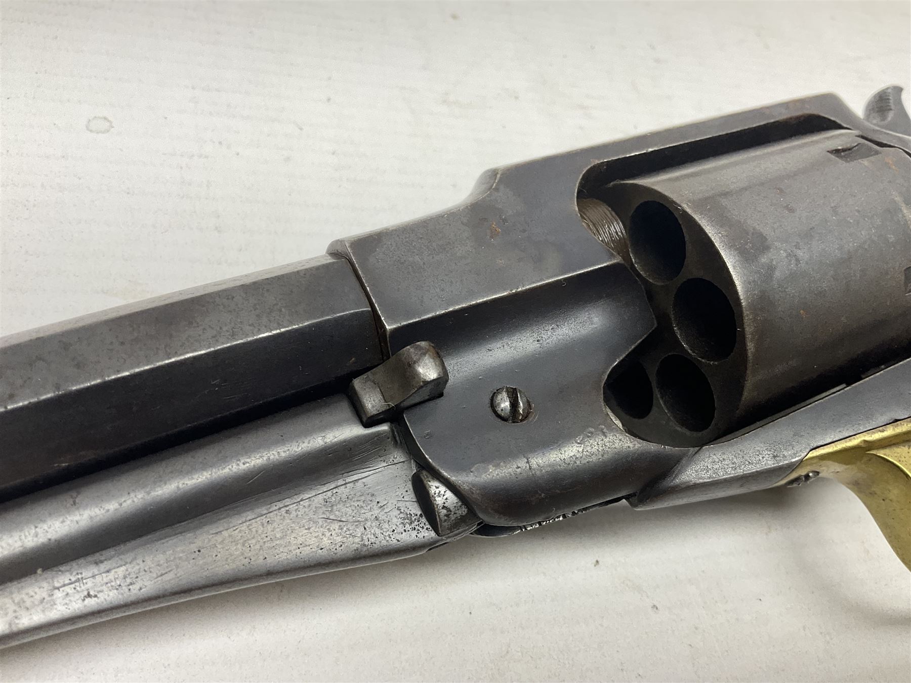 Unmarked Spencer & Rogers type Remington style .44 cal. six-shot percussion revolver, 20cm octagonal barrel with loading lever under, brass trigger guard and two-piece wooden grip L37cm overall; together with a framed watercolour by Alan J. Gray dated 2009 entitled 'The Remington .44 Calibre 1861 Navy Revolver'  19 x 42cm (2)