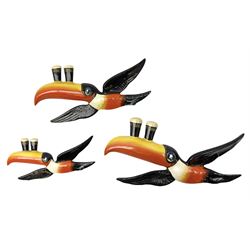 Set of three graduated Carlton Ware ceramic advertising wall plaques modelled as toucans balancing two pints of Guinness on their beaks, largest  L25.5cm
