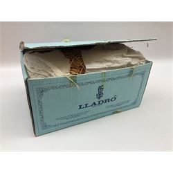 Lladro figure, Ford Fiesta, modelled as a Ford in beige, special commission by the Ford factory in Valencia, original box, no 7608, year issued 1989, year retired 1989, H9cm 