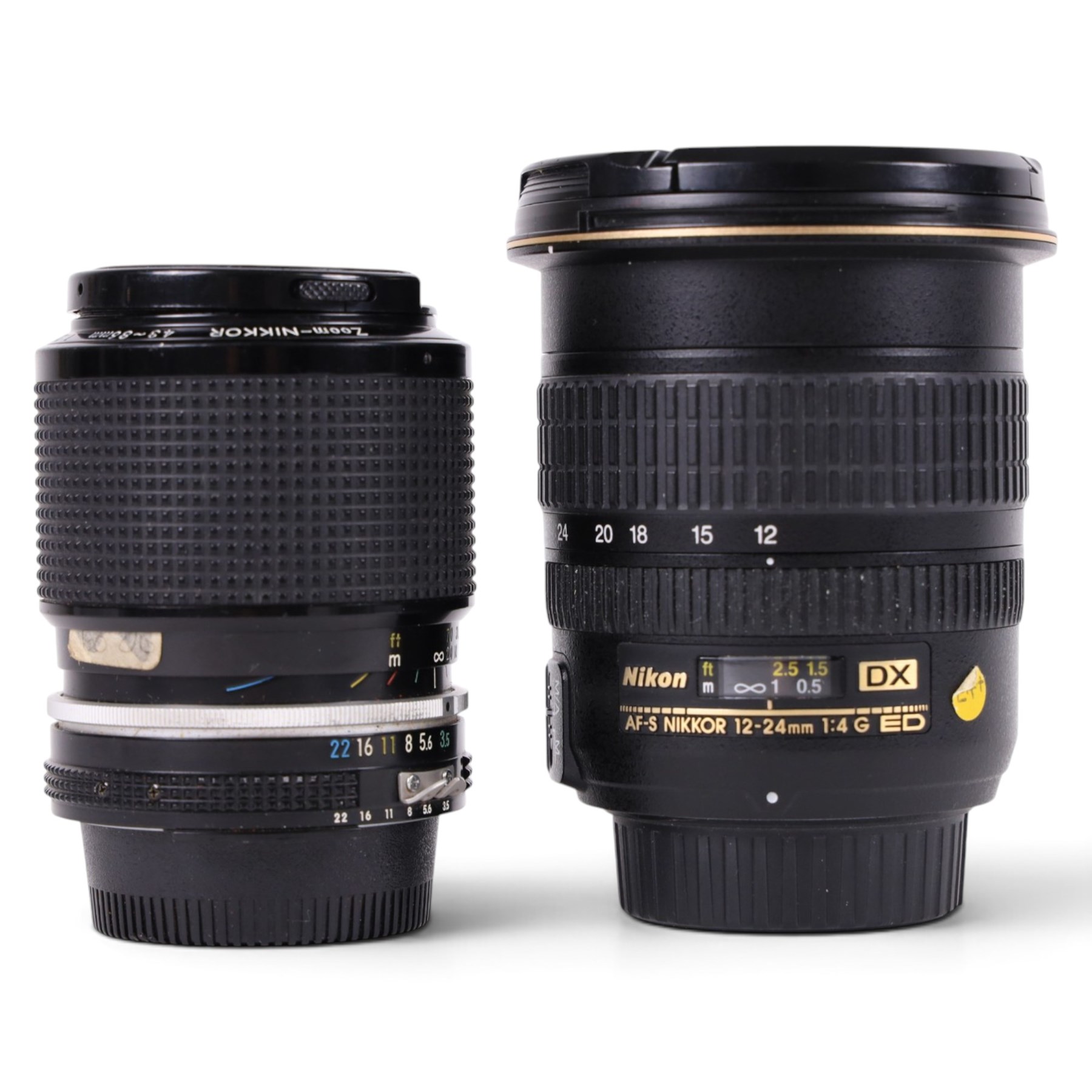 Two Nikkor lenses, comprising AF-S DX 12-24mm 1:4G ED serial no. 259461 and Zoom-Nikkor 43-86mm 1:35 zoom serial no. 1047648